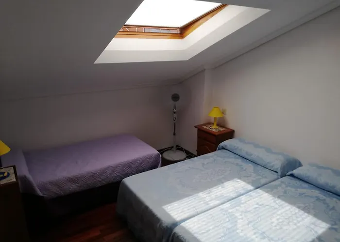 En La Playa Ideal Grupos بايونا